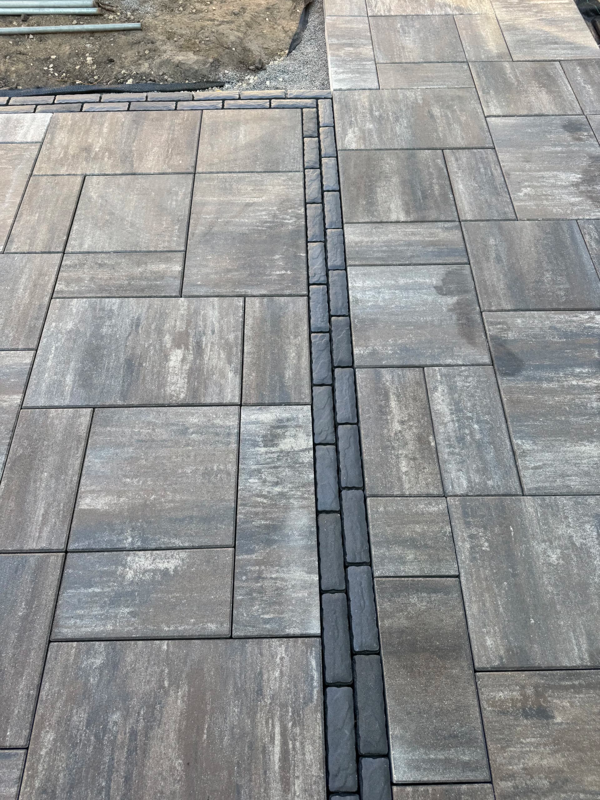 Paver Patios, Boulder Walls, and Full Excavation - Nearly There