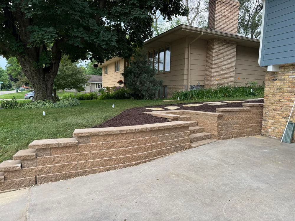 Elevating Outdoor Spaces with Stone Wall and Stair Design in Saint Anthony