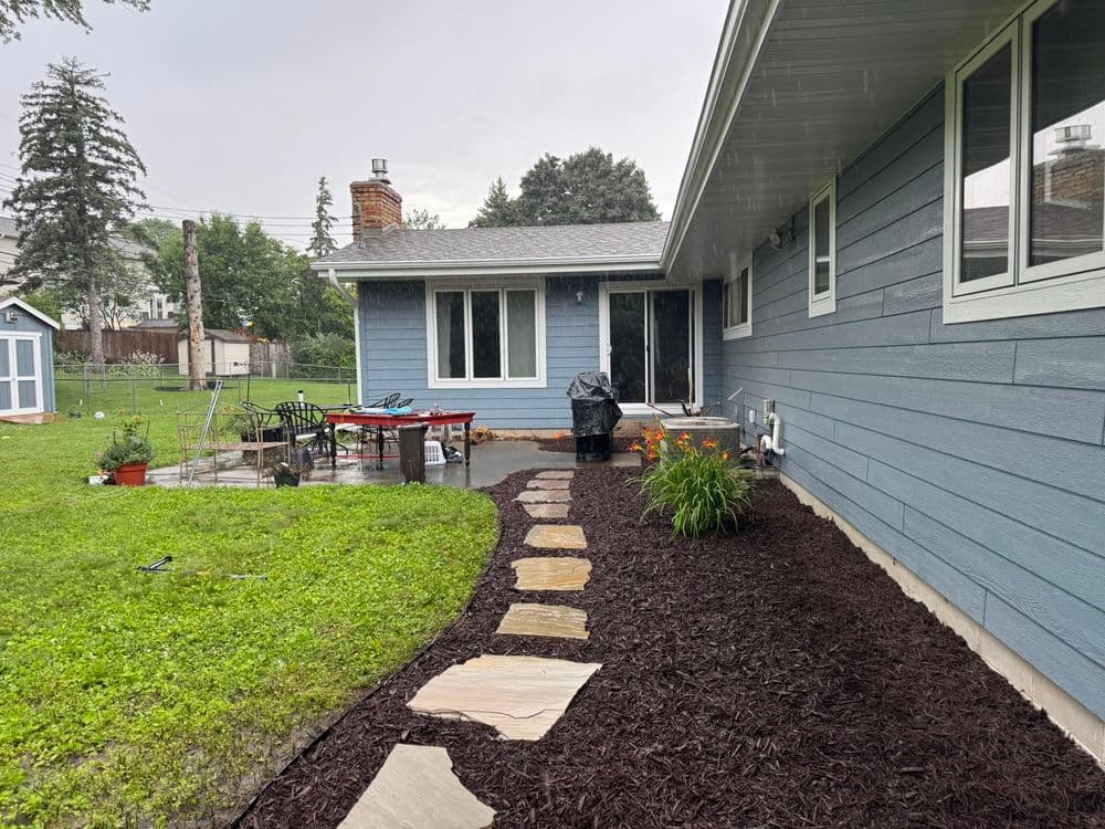 Elevating Outdoor Spaces with Stone Wall and Stair Design in Saint Anthony