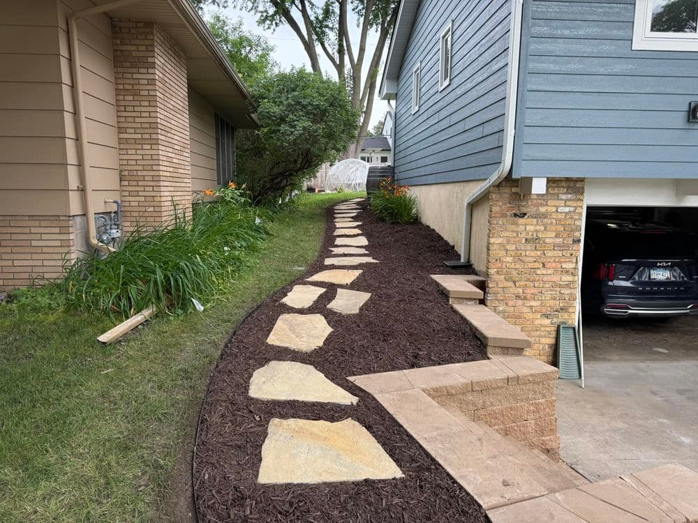Elevating Outdoor Spaces with Stone Wall and Stair Design in Saint Anthony