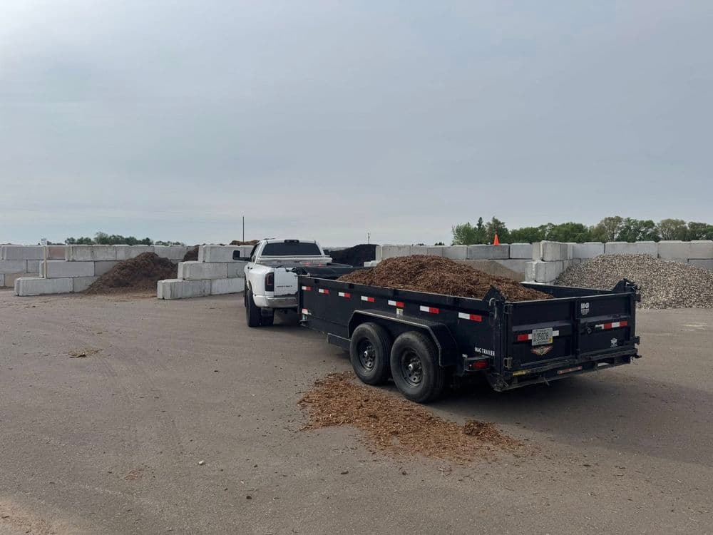 Transforming Outdoor Spaces in Roseville MN with Mulch and Boulder Edging