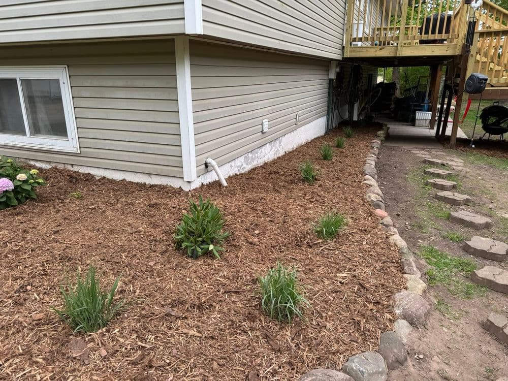 Transforming Outdoor Spaces in Roseville MN with Mulch and Boulder Edging