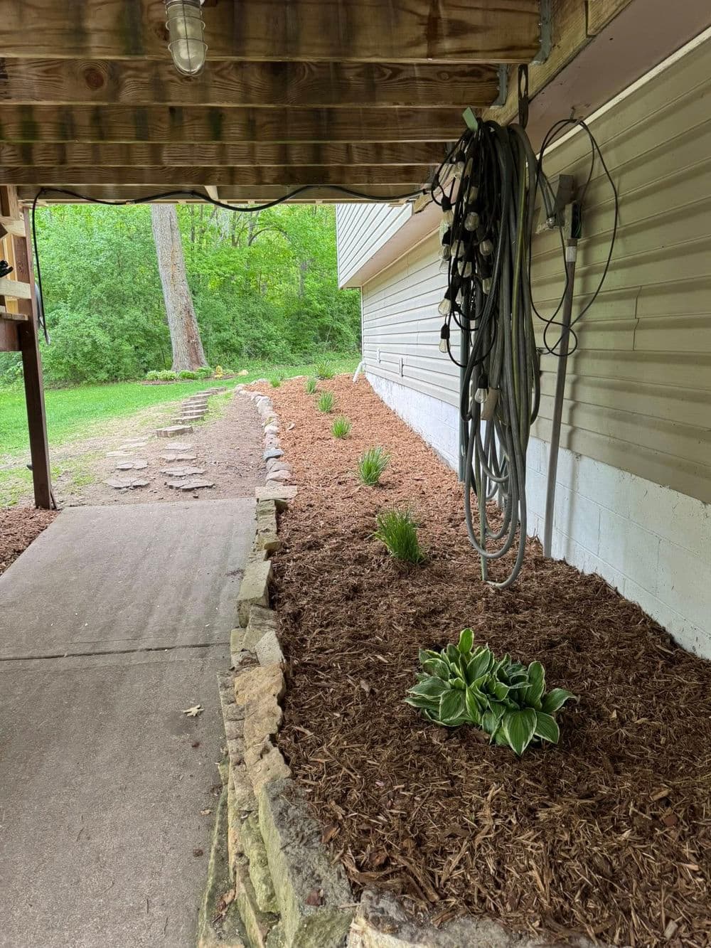Transforming Outdoor Spaces in Roseville MN with Mulch and Boulder Edging