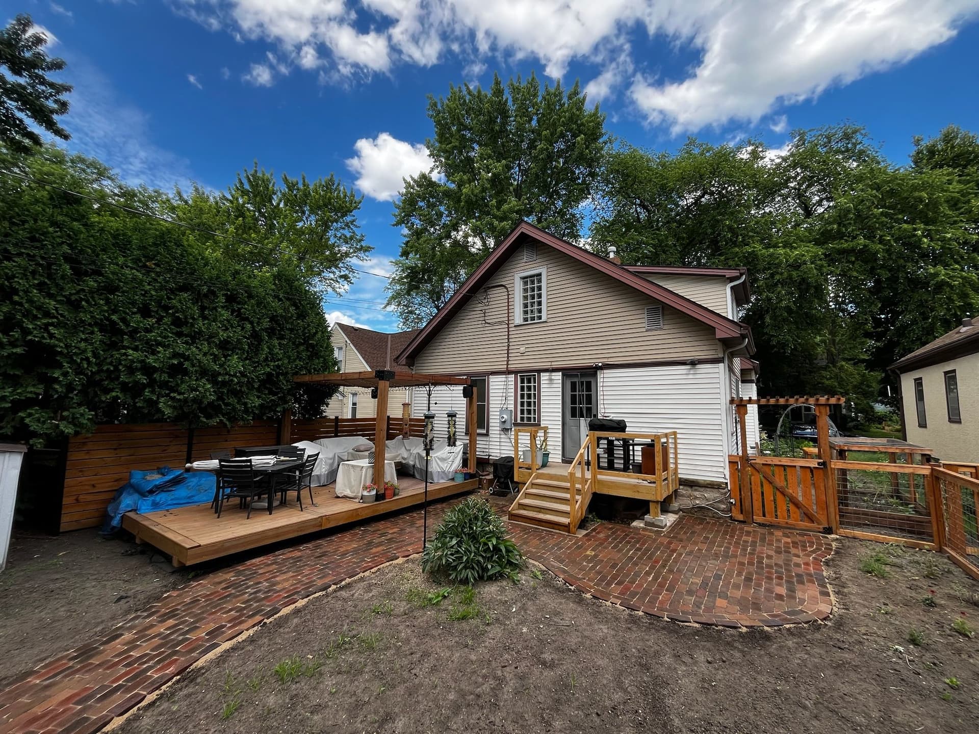 Gallery photos for Natural Stone Paver Patio Turns a Broken Backyard Into Usable Space in South Minneapolis: Image #1
