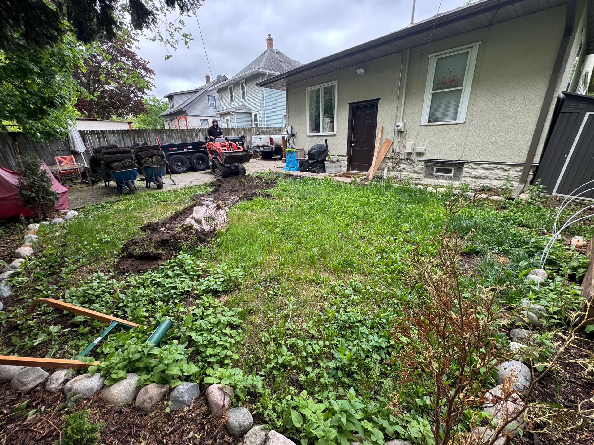 Gallery photos for Saint Paul Backyard Gets Clean Soil and Fresh Sod: Image #2
